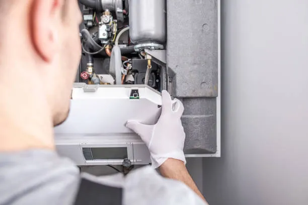 technician fixing hvac system in manteca