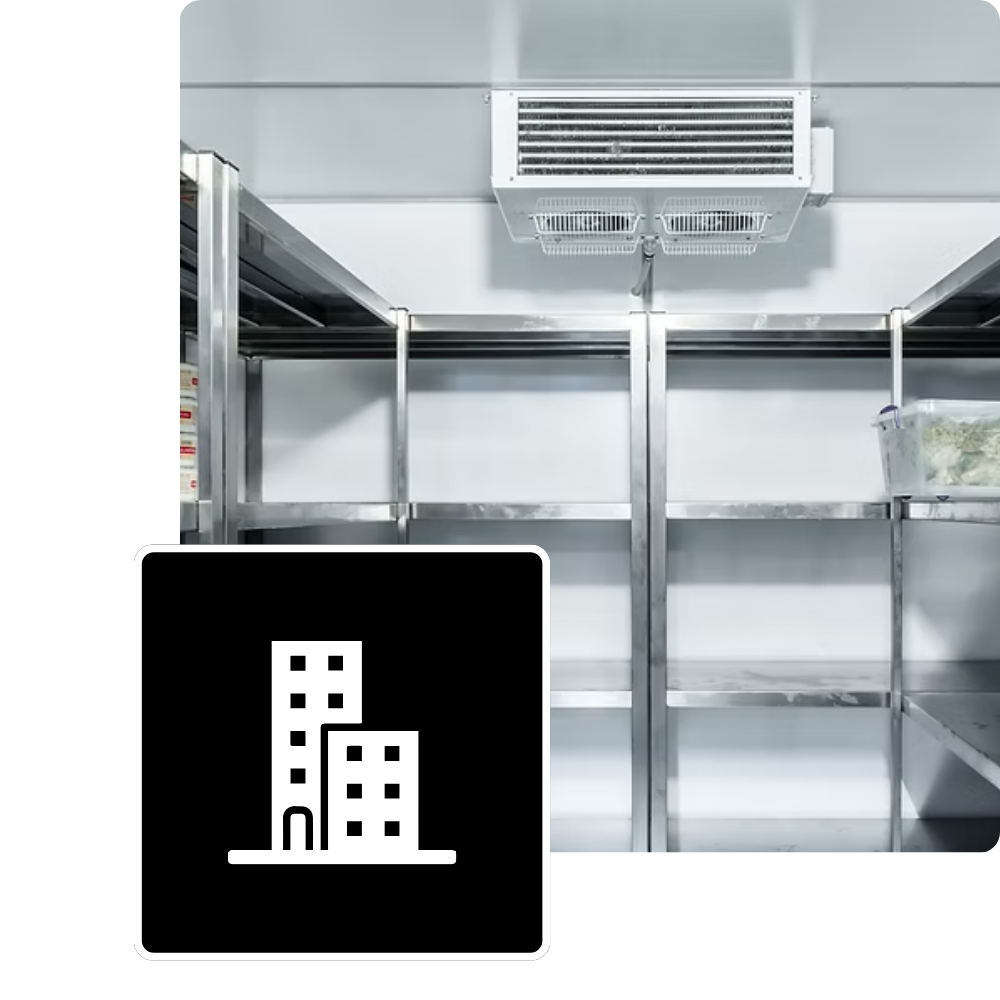 Commercial refrigeration unit with overhead cooling system in a stainless steel storage area, emphasizing energy-efficient performance for Manteca businesses.